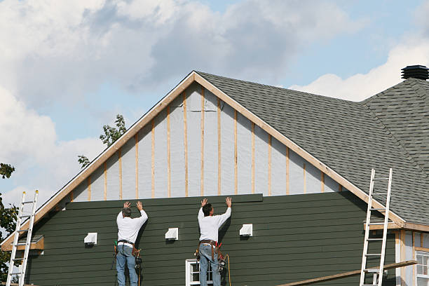 Professional Siding Contractor technician working in Uniondale, NY